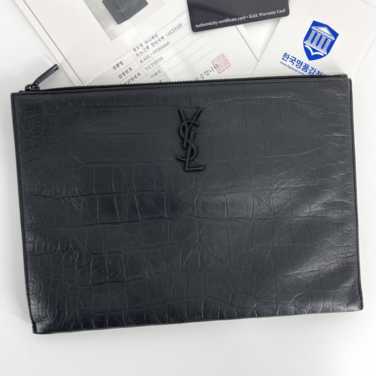 Saint Laurent Monogram Borsa pochette in pelle nera (453249) 140297983