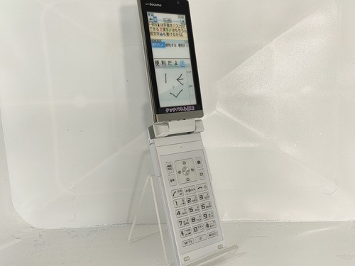 【Factice !】 Fujitsu F-01B (couleur blanc) docomo-japon téléphone portable qui ne fonctionne pas - Photo 2 sur 4