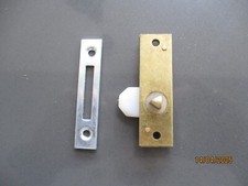 Brass Budget lock. Fits triangular section key.