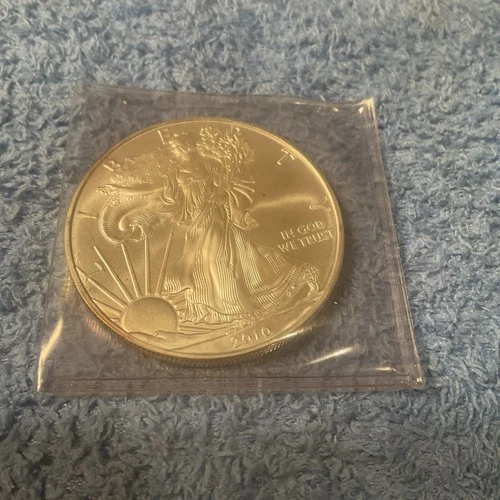 2010 1 Oz Fine Silver One American Dollar uncirculated As Pictured.