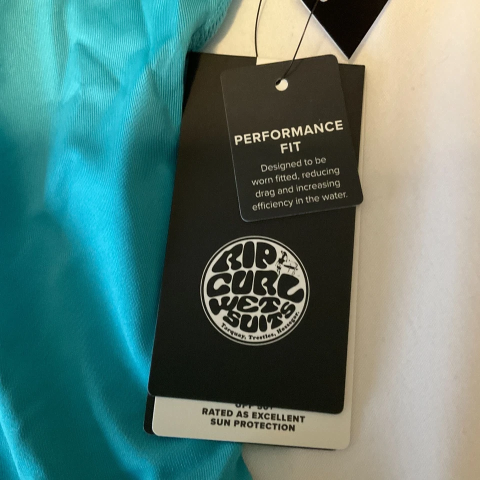 Camisetas antidesgarro Rip Curl protección contra erupciones niños talla 6 azul manga larga y corta 2 camisas Foto 2 de 4