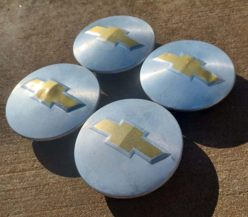 Juego de tapas centrales Chevrolet Traverse (4 piezas) 2009-2017, pieza # 9595116 Foto 2 de 3