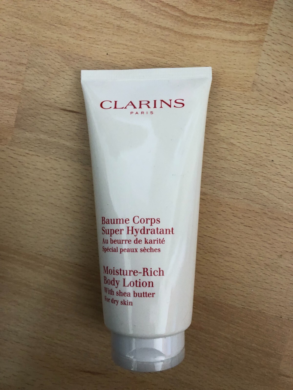CLARINS BODY CARE ESSENTIALS GIFT SET, NEW BUT DAMAGED BOX, BODY LOTION