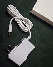 AC/DC ADAPTER OUTPUT: 12V 2A INPUT: 100-240V 50/60Hz MODEL: HXN 1220 FEMALE JACK