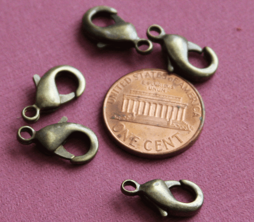 15 pcs of Antique Brass Lobster Clasps 15x8mm - Picture 3 of 5