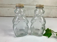VTG 2 Snow Crest Bear Shaped Shakers Bottles Clear Glass Metal Lids Beverages 5"