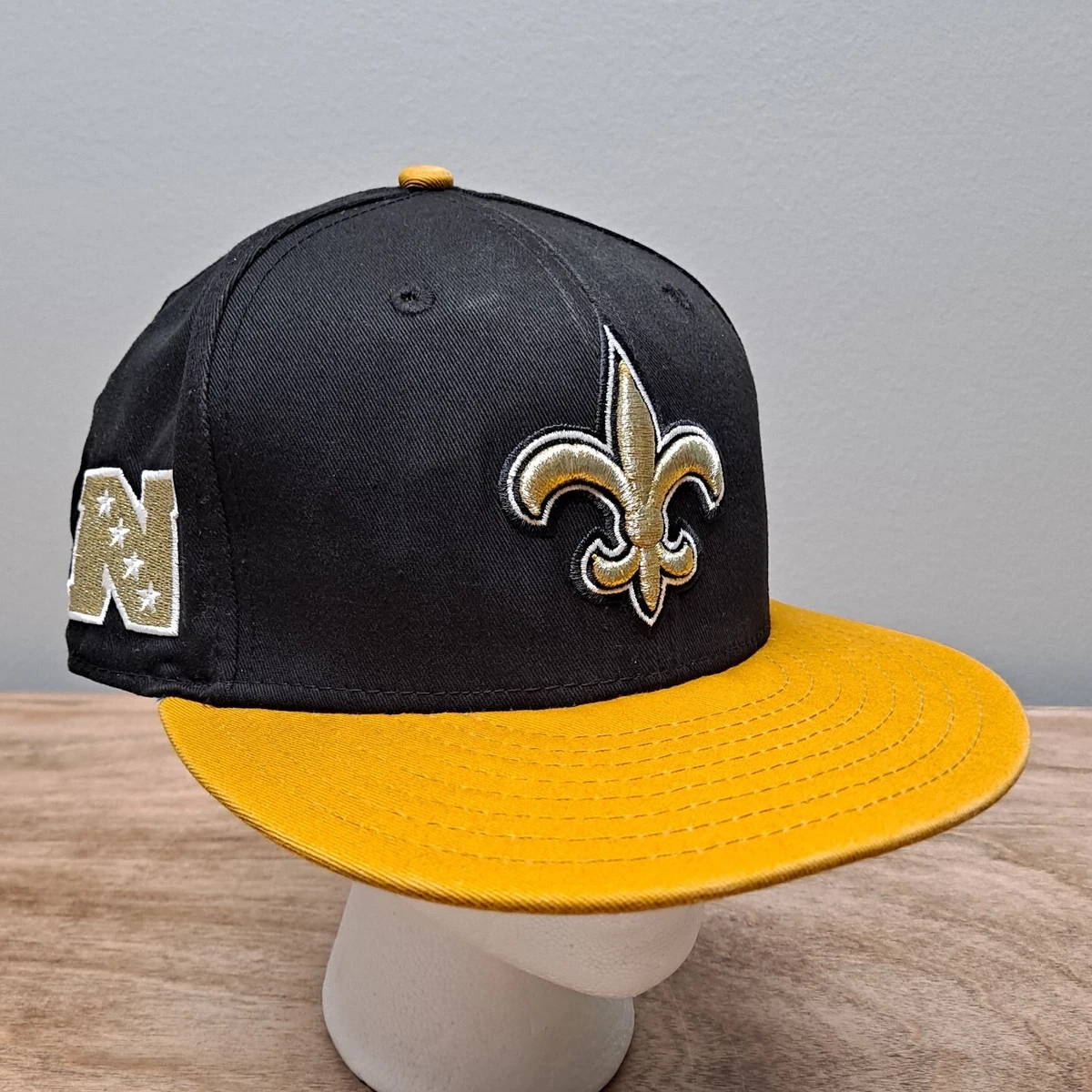 New Orleans Saints New Era 9Fifty Black/Gold S/M Snapback Cap Metallic Gold  Logo