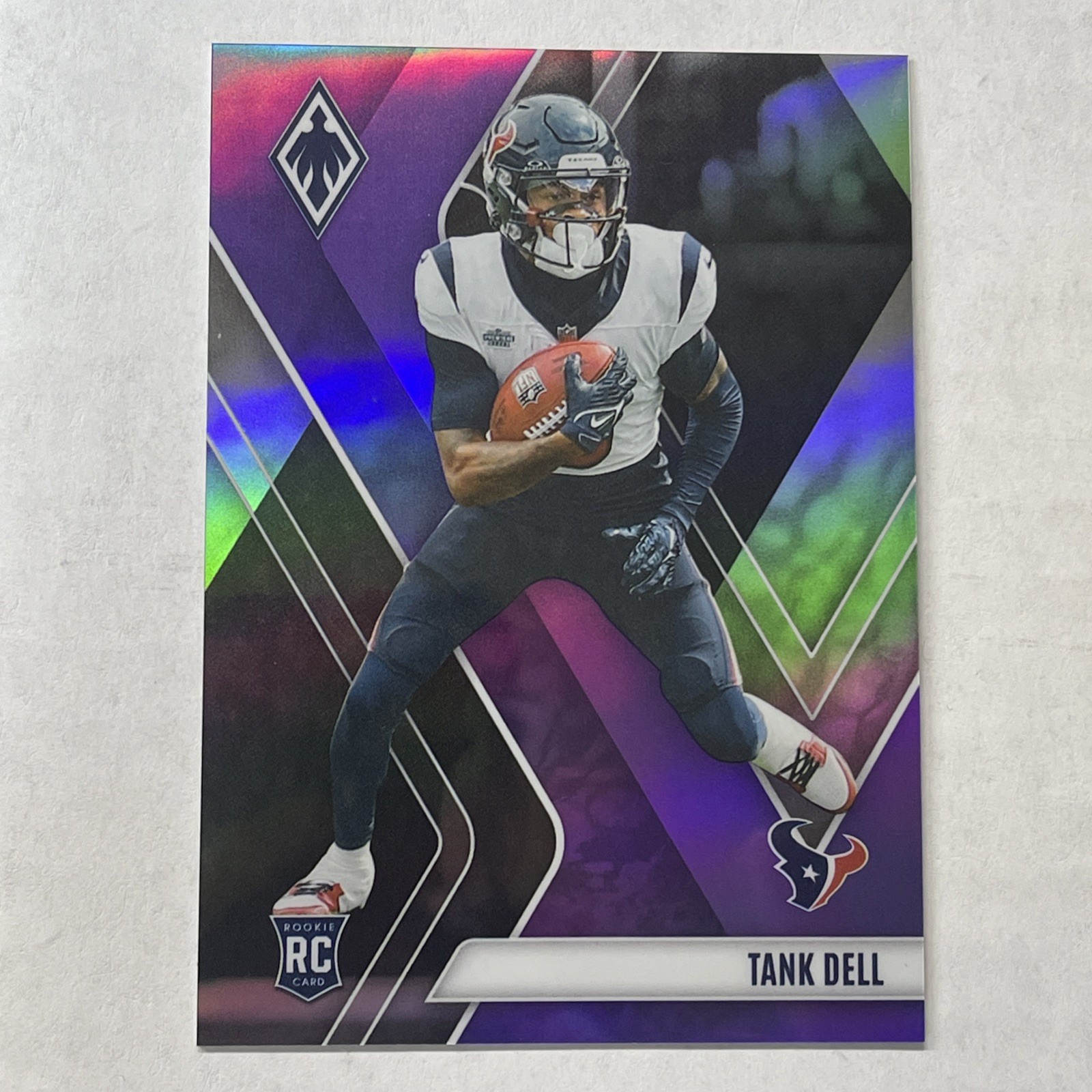 2023 Panini Phoenix - Tank Dell #135 Purple /125 (RC) Houston Texans