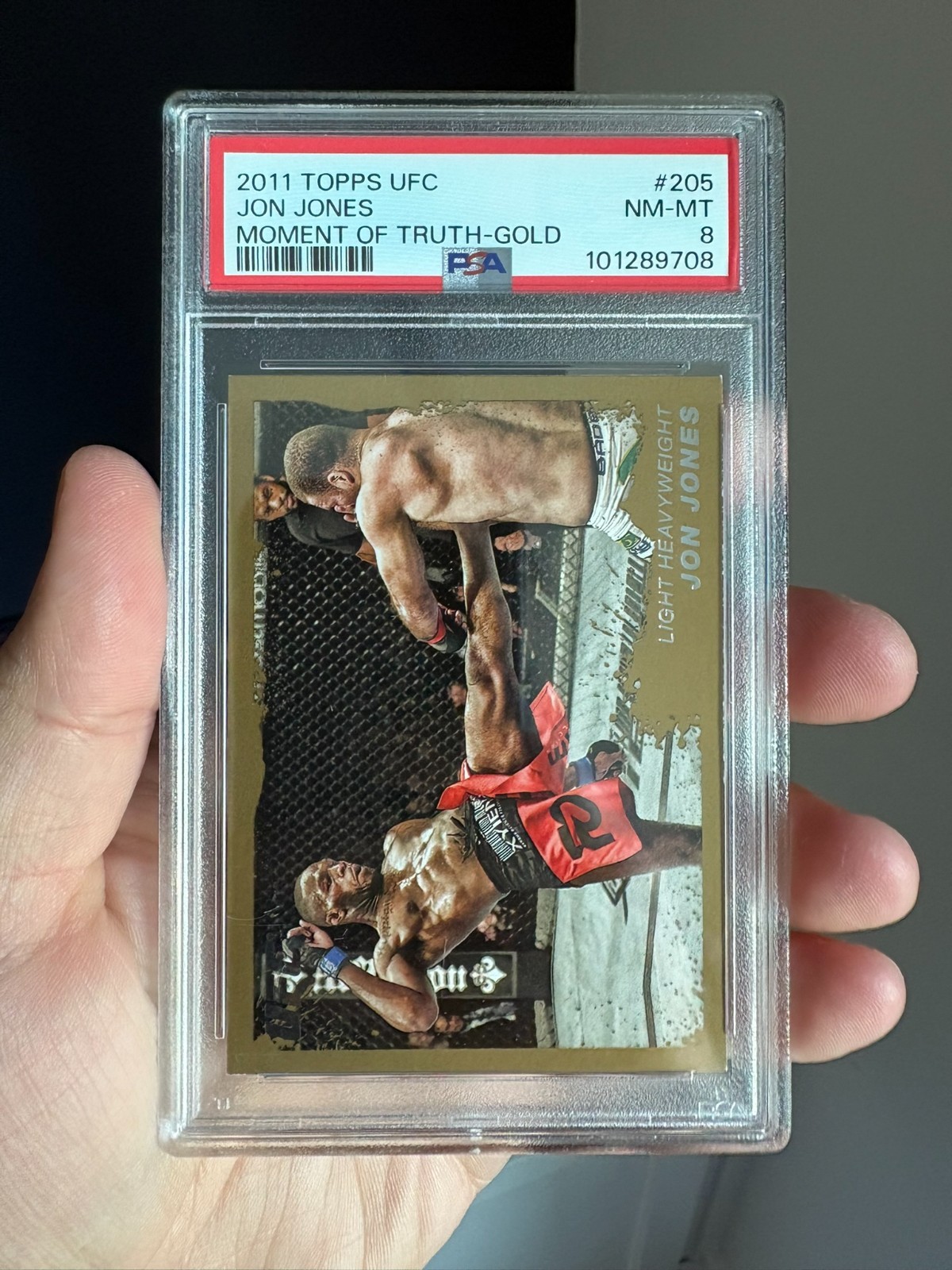 Jon Jones Gold - 2011 Topps UFC Moment of Truth #205 - PSA 8 view 2