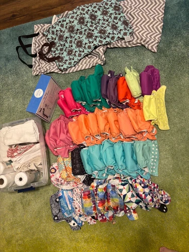 Huge lot of cloth diaper supplies (38 all in one diapers and extras!)