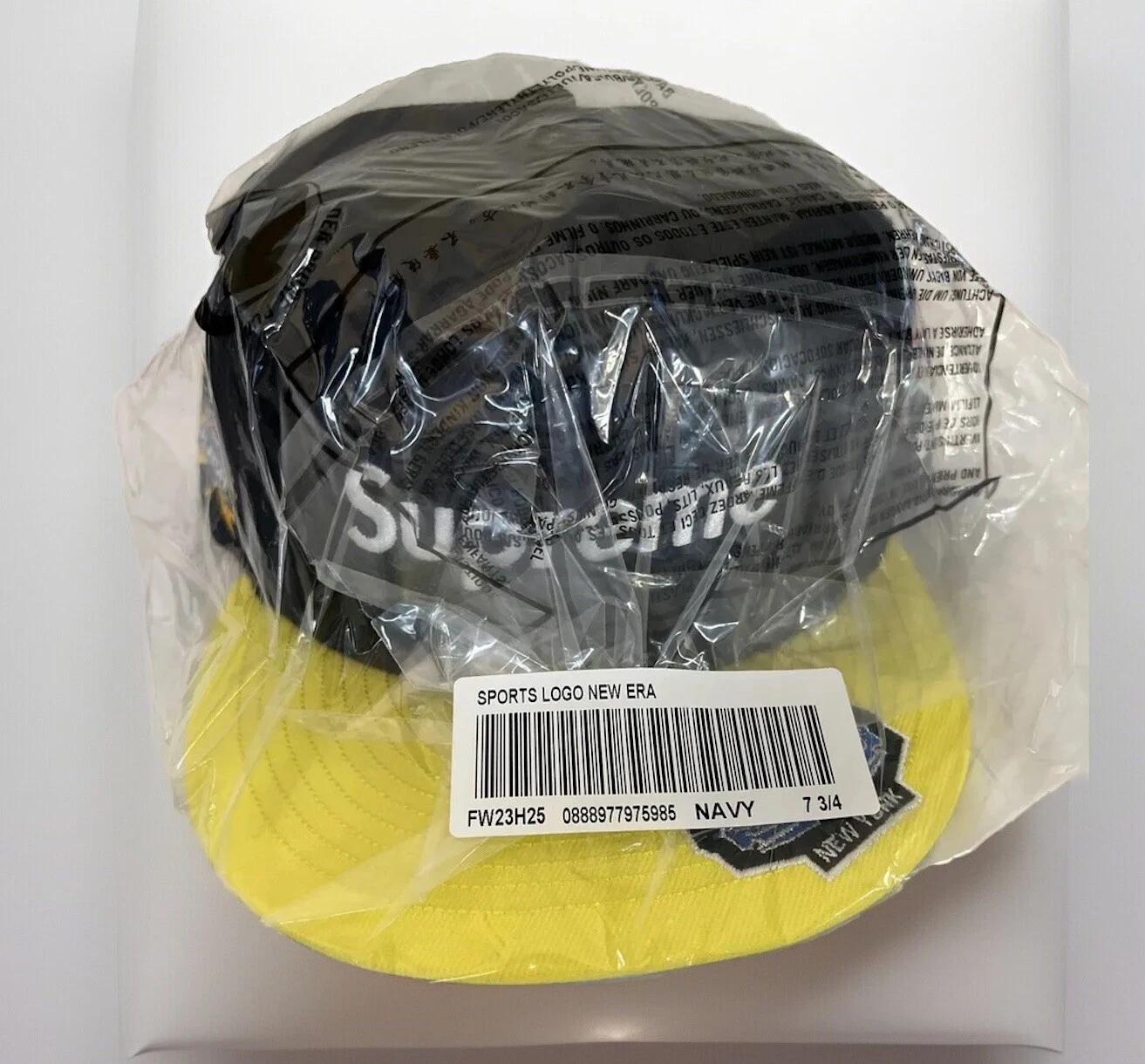 BOITE CHAMPIONNATS SUPRÊMES LOGO NOUVELLE ÉPOQUE CHAPEAU MARINE TAILLE 7 3/4 FW23 (AUTHENTIQUE) NEUF