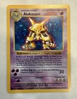 1999 Pokémon Base Set Alakazam #1/102 Shadowless Holo Rare – Non-1st Edition