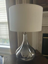 Henn&Hart 25'' Modern 1-Light Silver Glass Table Lamp  White Fabric Drum Shade