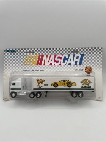 (4) NIP ERTL NASCAR TRANSPORTERS CITGO, KODAK, STP, COUNTRY TIME - Picture 4 of 9