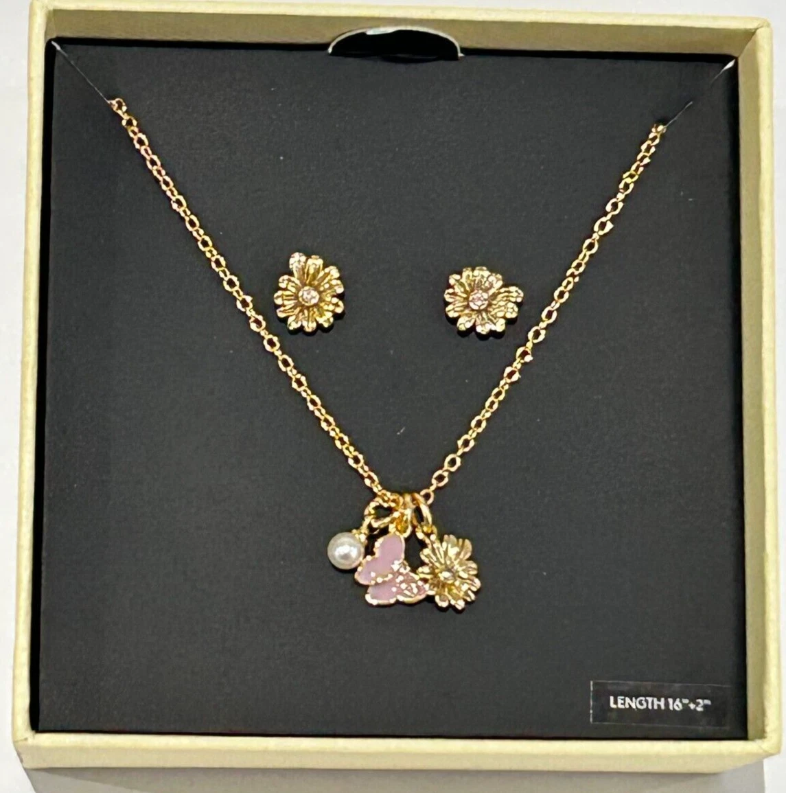 SET COLLANA E ORECCHINI COACH DUE PEZZI TONO ORO MARGHERITA E FARFALLA NUOVI E IMBALLATI