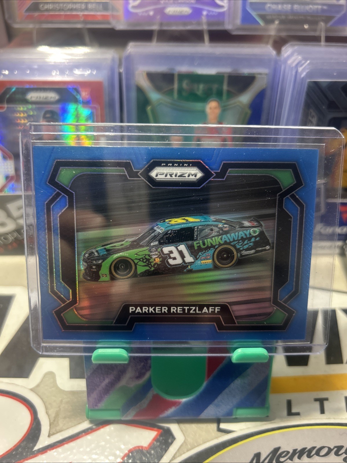 PARKER RETZLAFF 2024 PANINI PRIZM RACING NASCAR RIDES #5 CAROLINA BLUE PRIZM /49