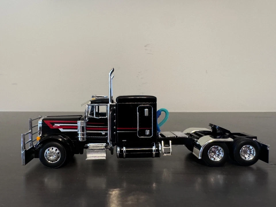 1/64 DCP/First Gear Peterbilt 379 w/ 63” Sleeper Black w/Red/White Stripes - Image 2 of 4