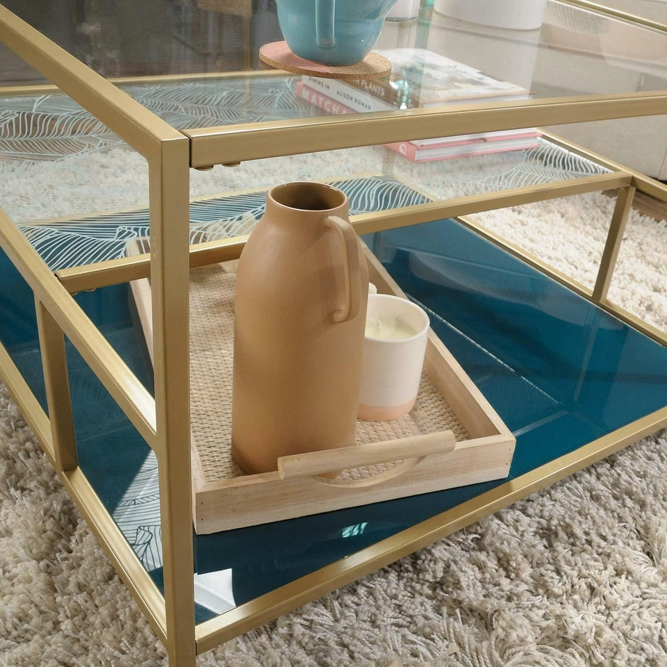 Mesa de centro cuadrada de vidrio Sauder Coral Cape con estantes, dorado satinado/transparente Foto 2 de 4