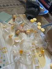 Medela Bottles and Pump Parts Lot