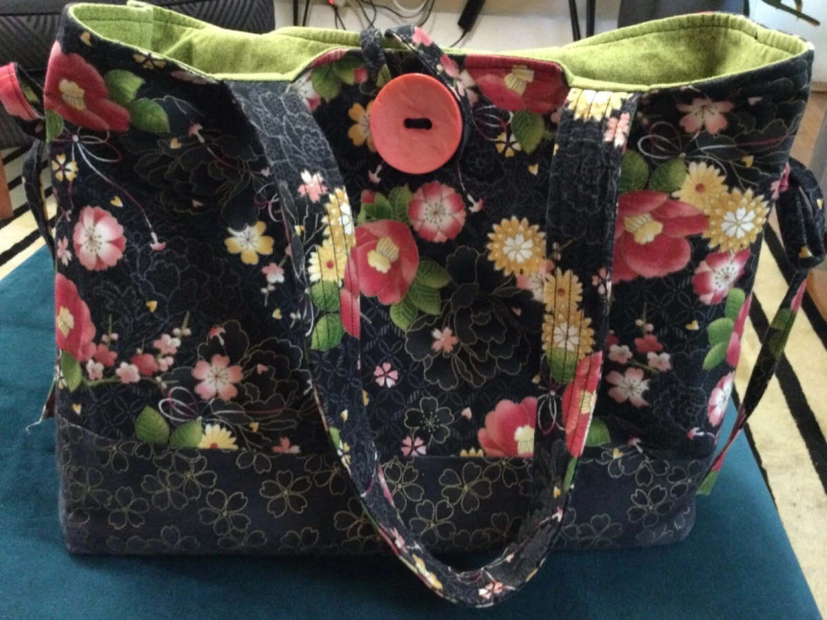 Black purse with flowers hot sale