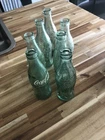 7 Vintage Coca Cola 6 Oz Bottles