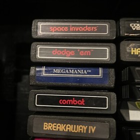 Atari 2600 Console With 16 Games, 4 Joysticks And 2 Paddles + Game Center