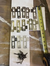13 Early 20th c Door Strikes, Brass and Steel