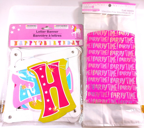 Happy birthday themed decorations, letter banner, and cello bags