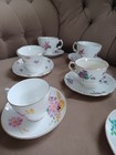 Set of 11 vintage/antique bone china teacups and saucers. — photo 6