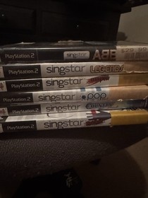 PS2 SingStar Bundle w/ 4Microphones USB Adapter & 6 Games Tested & Working