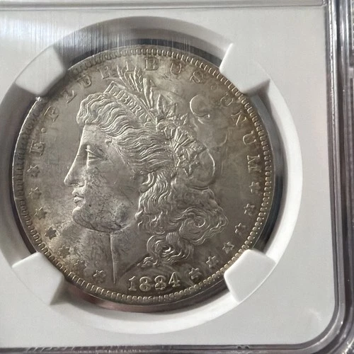 1884 O Morgan Silver Dollar $1 NGC MS63 Toned