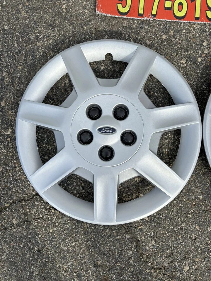 Ford Taurus 2005-07 16”2 tapacubos OEM atornillado reacondicionado uno 7043 p/n 5f1z1130aa Foto 2 de 4