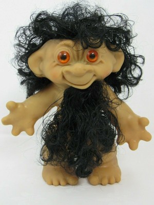 black troll doll with blonde hair