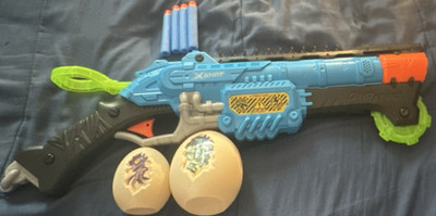 ZURU Toy Foam Dart Blaster Blue with 4 Foam Darts & 2 Dinosaur Egg Toys