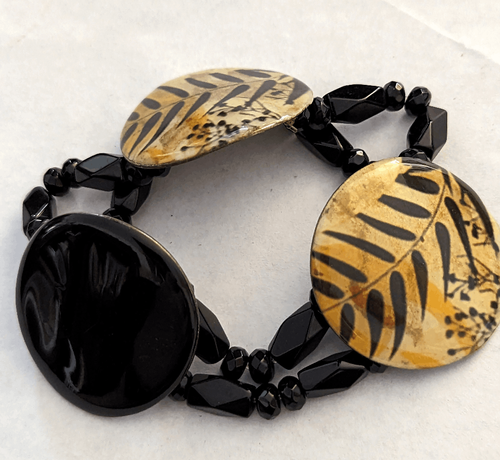 Bracciale tribale elastico naturale modello felce 8"