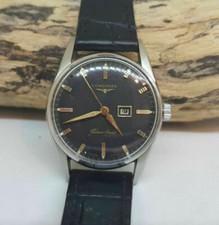 OROLOGIO UOMO USATO ANNI 60 LONGINES ARGENTO FRECCIA QUADRANTE NERO DATA CARICA MANUALE 23.ZSD
