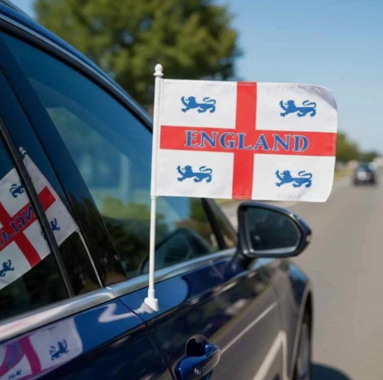 England flag with the St George cross in red and white flying from a England flag with the St George cross in red and white flying from a