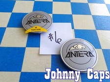 Tapa central ANTERA 143 ruedas PLATEADA # N/A. BLANCO. Tapas centrales personalizadas (PAR de 2)