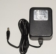 AC Adapter Model AD-1200-3A1-UC Input 120 VAC Output 12.0 V DC 1.2 A