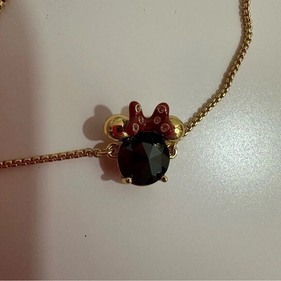 Brazalete Deslizante Dorado Kate Spade x Disney Minnie Mouse Foto 2 de 4