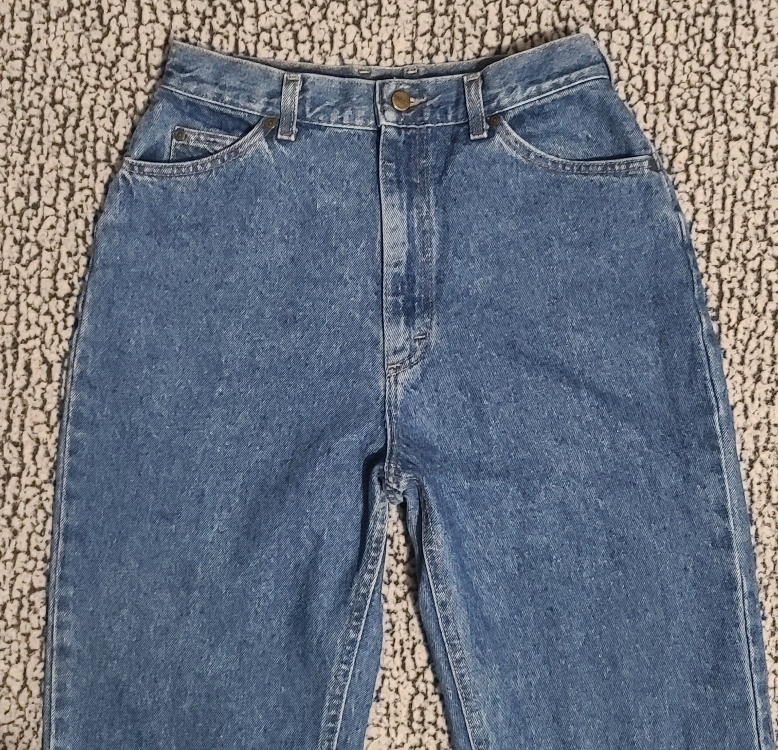 Blue high-waisted L.L.Bean mom jeans with front pockets, button closure, and belt loops, made in USA Medium Wash denim.