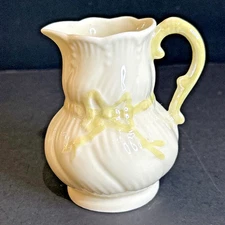 Belleek Ribbon 3.25” Mini Creamer Pitcher Irish Porcelain Yellow Bow
