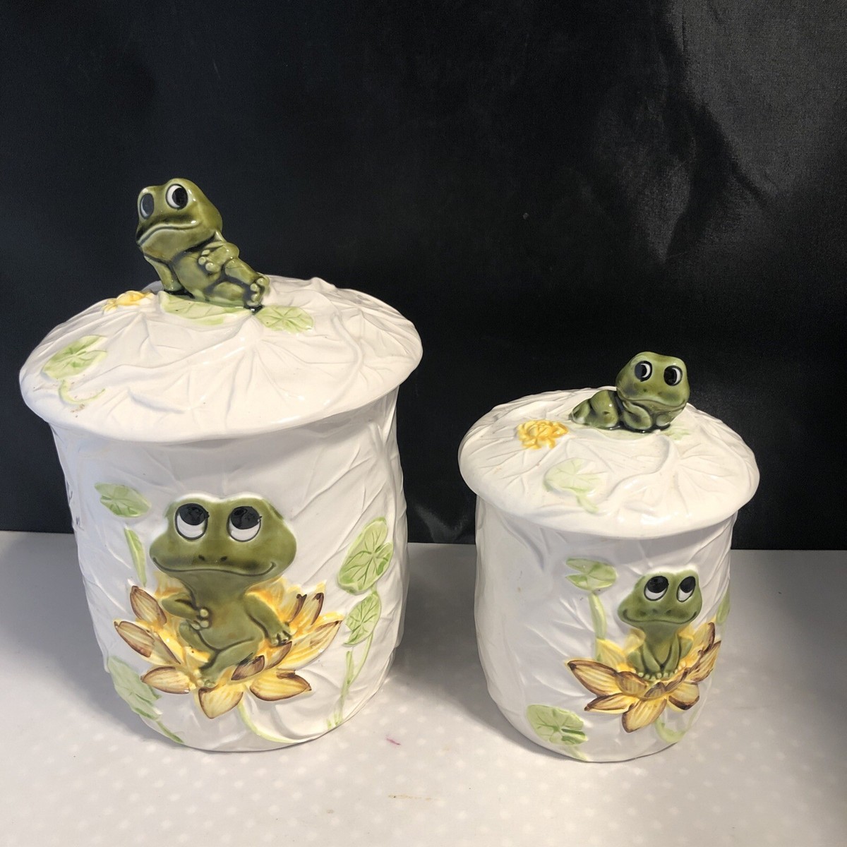 2-piece Neil the Frog Sears Roebuck ceramic canister set with lids