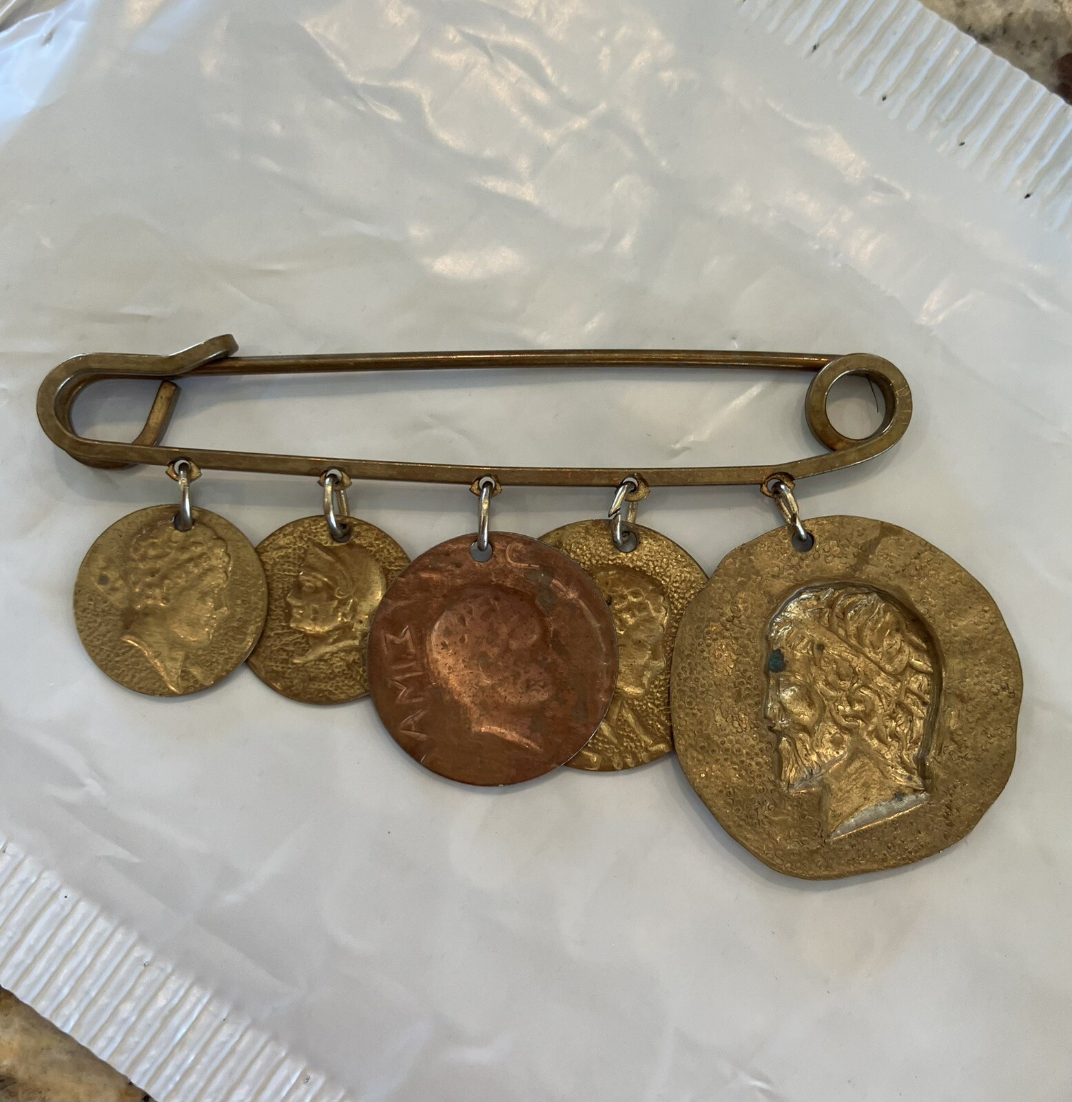 VINTAGE BRASS SAFETY PIN WITH 5 ANTIQUE ROMAN COINS CHARMS VERY LARGE 3