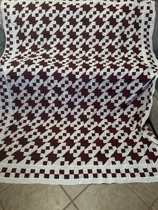 Handmade geometric pattern quilt TOP in maroon and white.