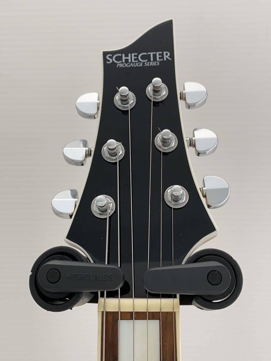 Black SCHECTER PA-SW/TH/See-Thru electric guitar with silver hardware and six-string neck, positioned against a neutral background.