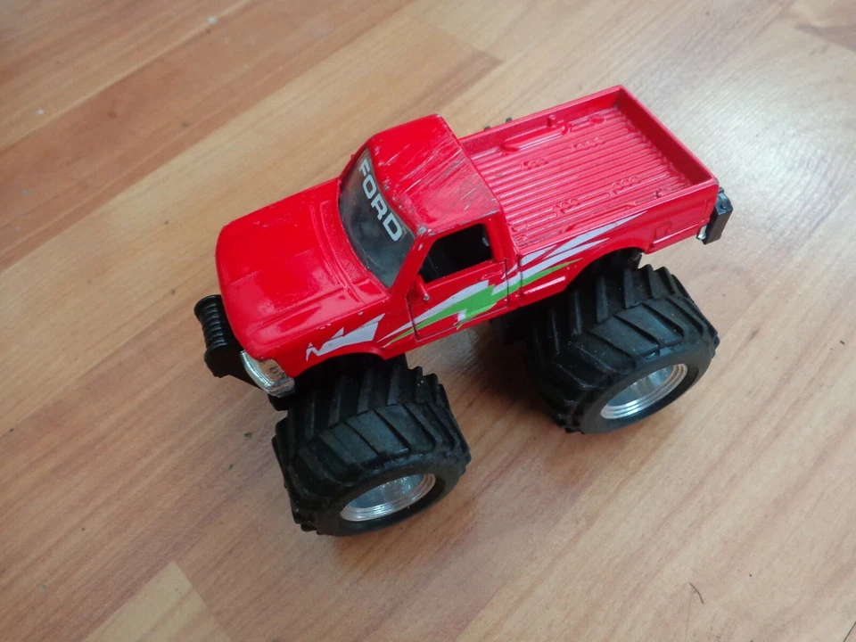 MAISTO 1/43 - CAMION MONSTRE JOUET FORD F-SERIES EN DIECAST ROUGE - Photo 1/2