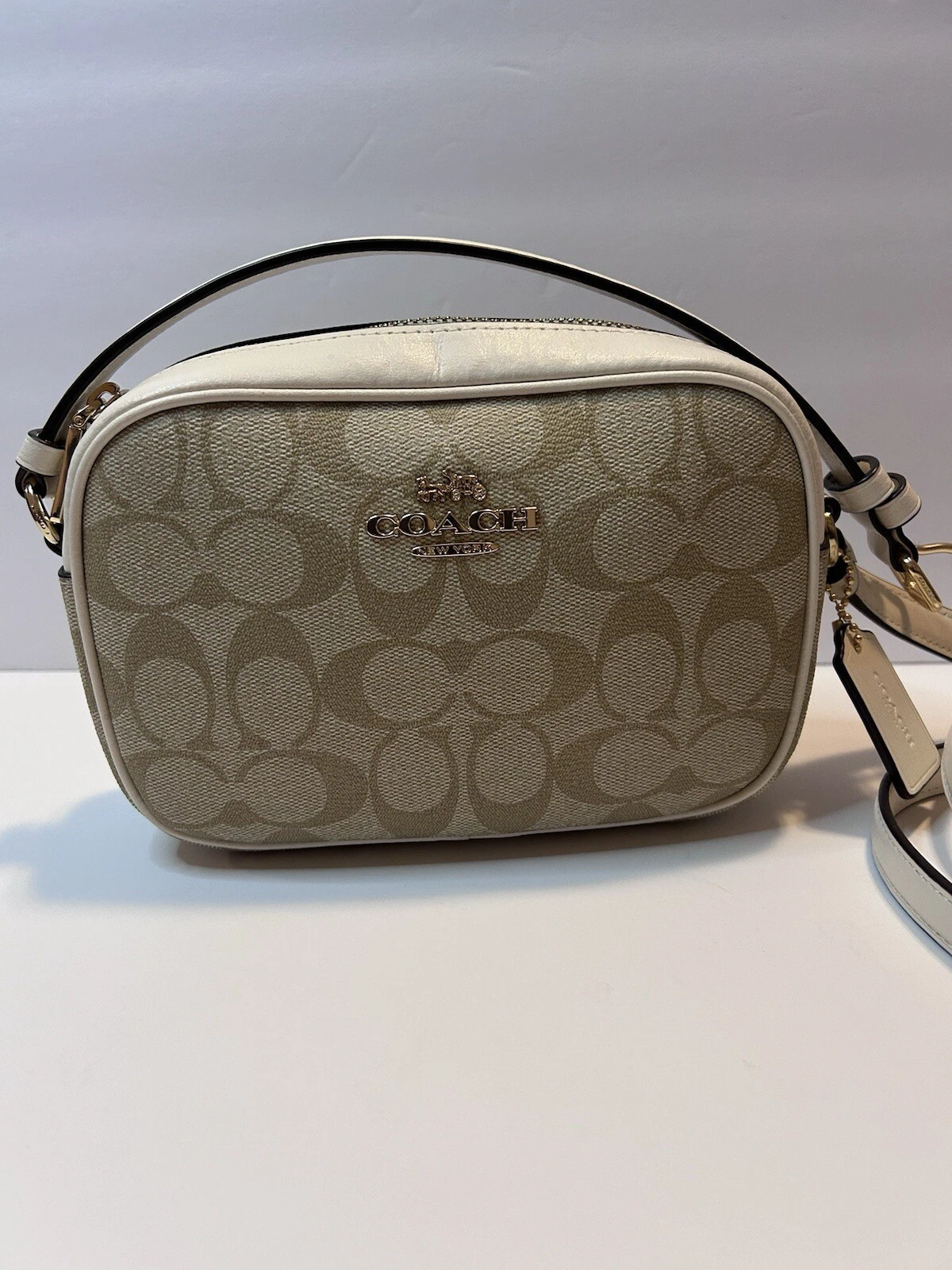 Coach Jamie mini borsa fotocamera firma tela rivestita cachi chiaro gesso usata in ottime condizioni