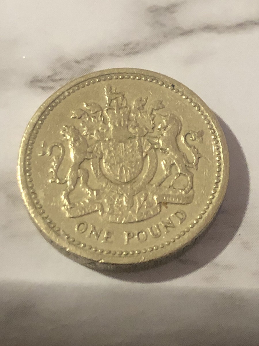1983 ONE (1) POUND QUEEN ELIZABETH II COIN WITH UPSIDE DOWN