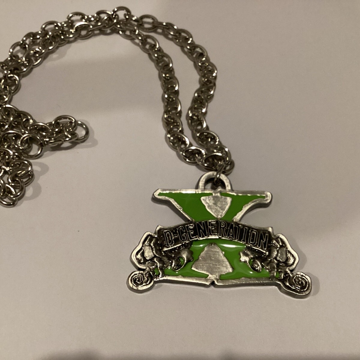 100% Authentic WWE 2009 Chain Pendant D Generation X DX HHH